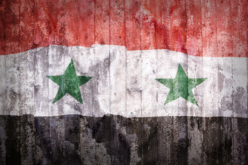 Grunge style of Syria flag on a brick wall