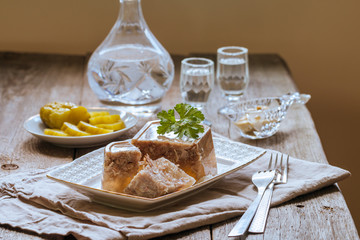 Jellied meat on the white plate