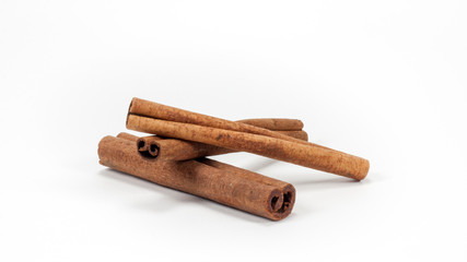 Cinnamon sticks isolated on white background