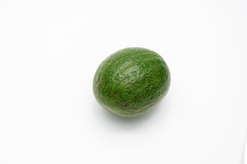 Green avocados isolated on a white background