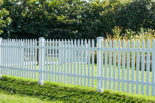 White picket fence in a garden