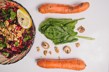 Vegetarian salad with purple cabbage.carrot.lay flat.