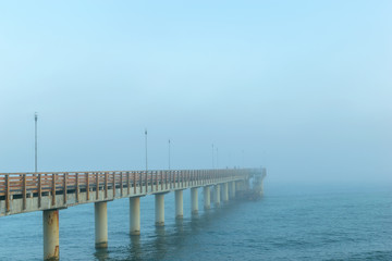 Pier in the fog in Zelenogradsk on the Baltic sea