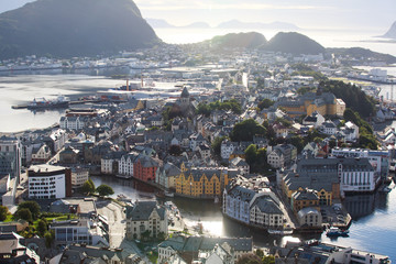 Beautiful super wide-angle summer aerial view of Alesund, Norway, with skyline and scenery beyond the city, seen from the observation deck of Aksla mountain - obrazy, fototapety, plakaty