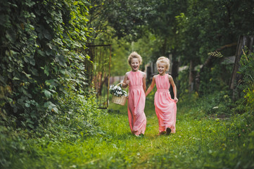 Children walk along the summer garden 6581.