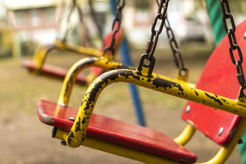 Empty chain swing in playground