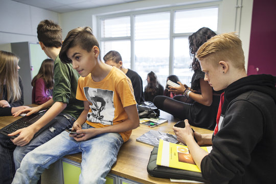 Schoolchildren (12-13, 14-15) in classroom