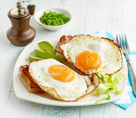 fried eggs on white plate