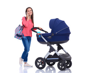 Full length portrait of a mother with a stroller, isolated on white background