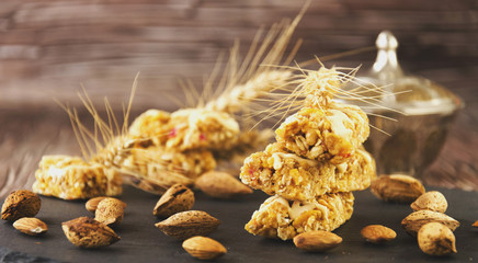Cereal bar with nuts, selective focus