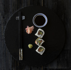Sushi , chopsticks and sauce, selective focus