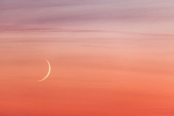 Moon crescent and pastel colors sunset sky