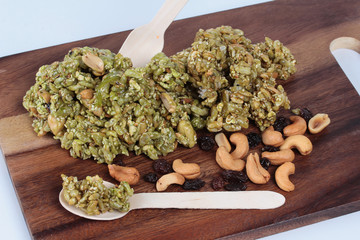 Krayasart is a tradition Thai sweet crunchy dessert with currant and cashew nut on butcher served....