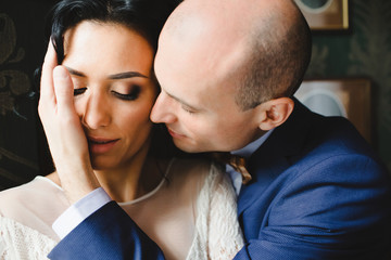 Portrait of beautiful luxury newlyweds