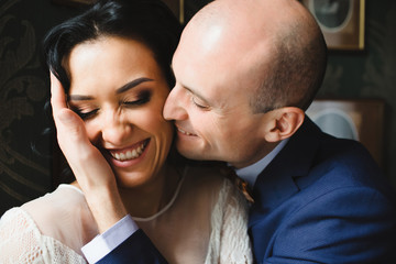 Portrait of beautiful luxury newlyweds