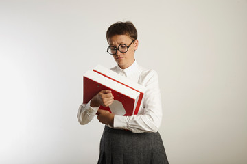Portrait of a tired teacher with binders