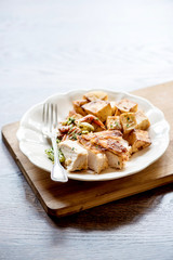 Served turkey meat and potatoes