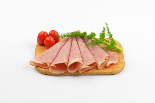 ham slices with dill and cherry tomatoes