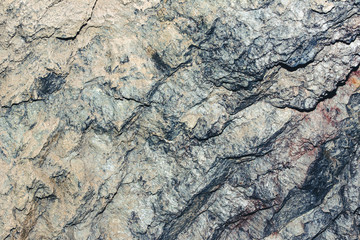 Rocky wall underground tunnel background.