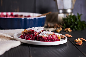 Cherry pie and a cup of coffee. Rustic style. Berry pie. Homemade cherry pie with flaky crust, cup of coffee, bowl with cherries