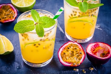 tropical cocktail with passion fruit, lime and mint