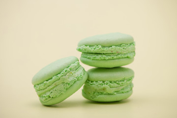 cookies green color of the round form on a light green background