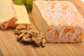 cheese on wooden board