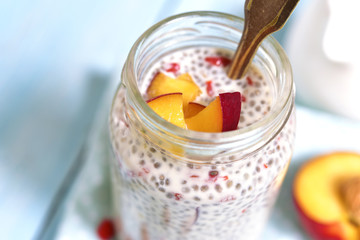 Chia seed pudding with peach and goji berri.
