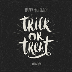 Trick or treat - hand drawn calligraphy. Halloween vector illustration. Holiday poster, invitation or greeting card.