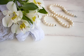 Preparation for rendezvous, woman accessories and romantic motives