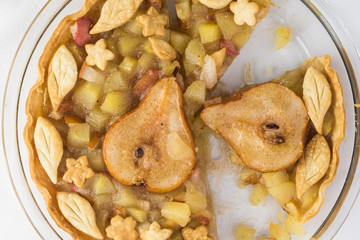 Fresh baked cut spicy pear pie.