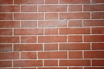 Structured red brick wall