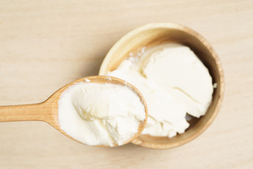 Healthy silken tofu dessert with honey on wood background - 120481206