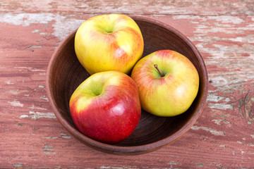 apple on a wooden table