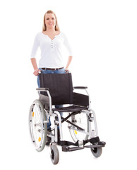 Woman pushing wheelchair