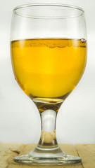 Beer in water goblet on white background