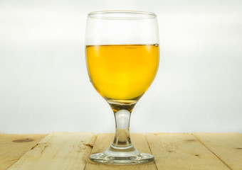 Beer in water goblet on white background