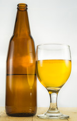 Beer in water goblet on white background