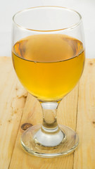 Beer in water goblet on white background