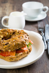 Bagels with cream cheese and smoked salmon with vegetables
