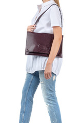 Naklejka premium Woman holding a handbag isolated on white background