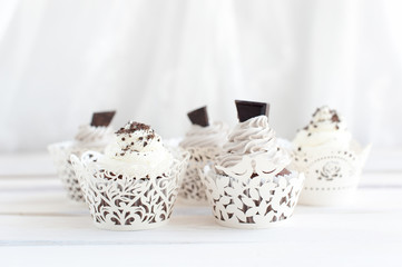 Five delicious cupcakes with chocolate chips