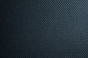 Deep blue fishnet cloth material as a texture background. Nylon texture pattern or nylon background...