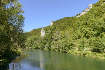 Fototapeta na wymiar cliffs and forest on Donau river banks near Thiergarten, Germany 