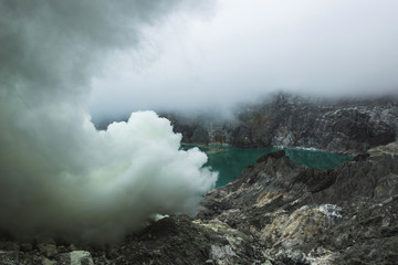 Fototapeta na wymiar Dangerous trip Inside Ijen volcano crater