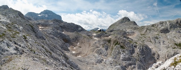 panorama of Triglav, Begunjski vrh with  Dom Valentina Stanica mountain hut in Julian Alps in Slovenia