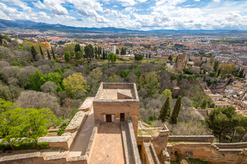 Fototapeta na wymiar Panoramic view Granada town from the tower of Alcazaba, the military fortress of Alhambra de Granada, a World Heritage Site in Andalusia, Spain.