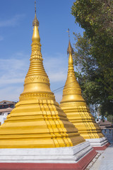 Fototapeta premium Myanmar pagoda golden color in temple at Myawaddy