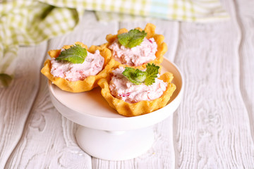 tartlets with creme cheese and berries