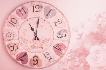 love clock with pink flower